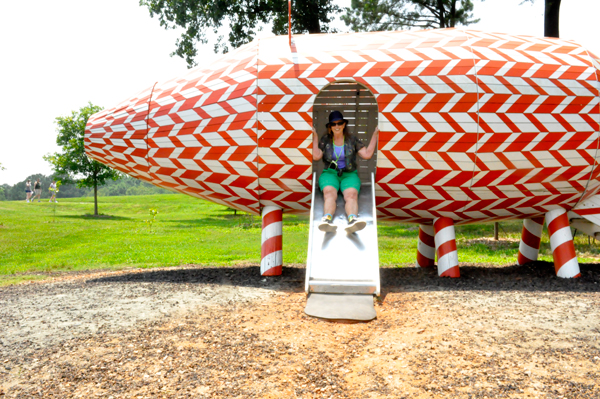 Karen Duquette on the pig-shaped slide